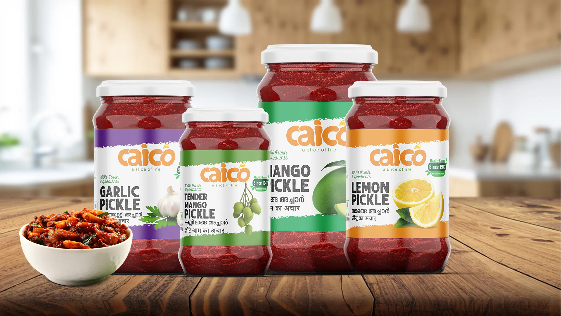 Front view of Pickle Bottle label design created for The Canning Industries Cochin Ltd., Thrissur, featuring branded label and food grade packaging layout